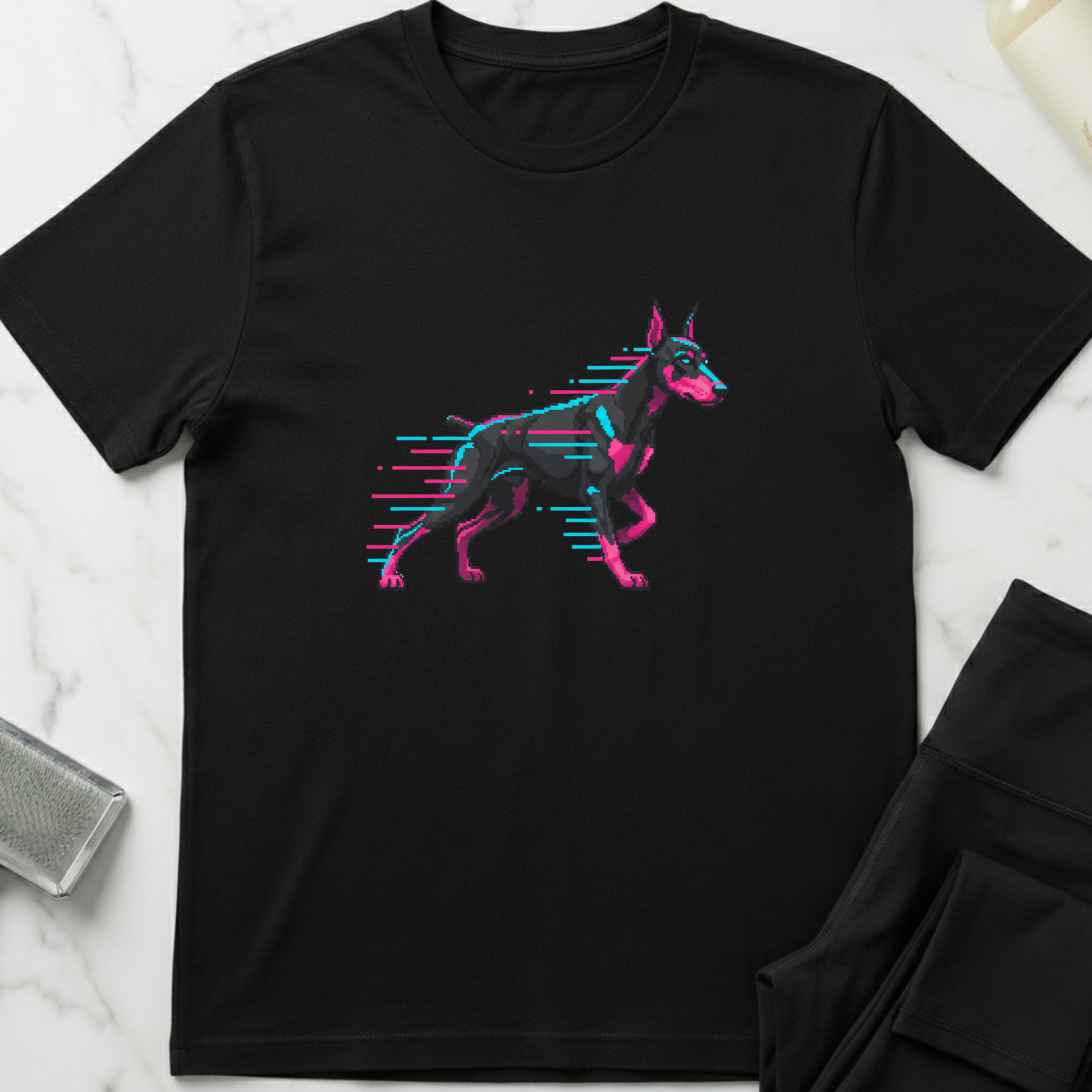 Black t-shirt with a graphic of a dog on a marble surface. Minimalist dog apparel by pemuyo.