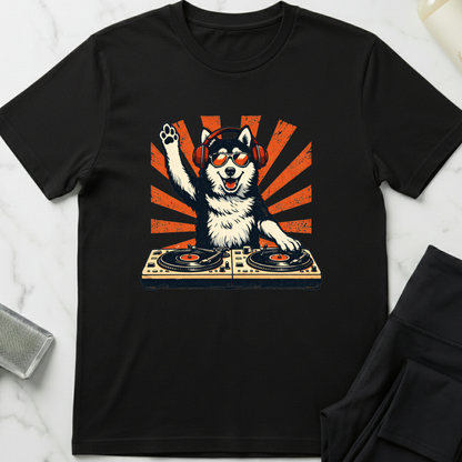 Black t-shirt with a graphic of a dog DJ on a white marble surface. Minimalist dog apparel by pemuyo.