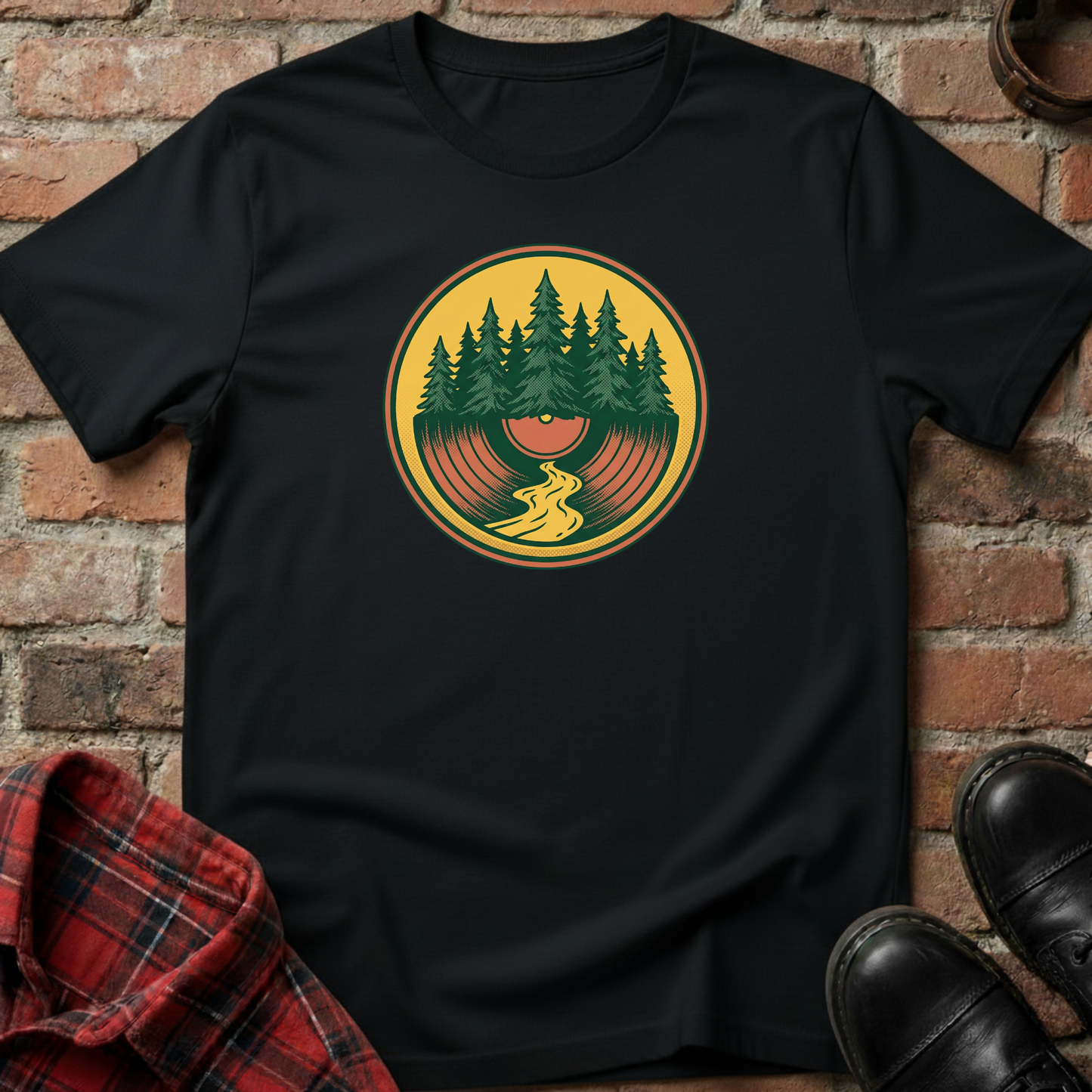 Black t-shirt with a nature-themed graphic on a brick background. Minimalist music apparel by pemuyo.