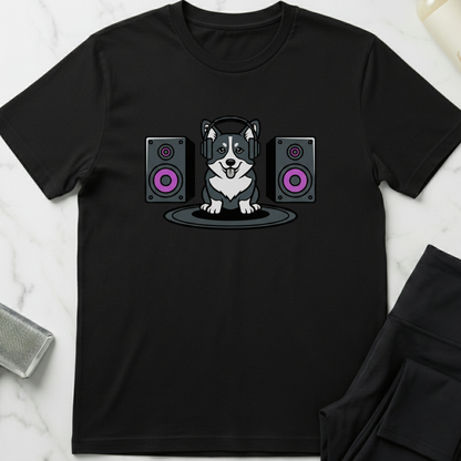 Black t-shirt with a dog wearing headphones and speakers design on a marble surface. Minimalist dog apparel by pemuyo.