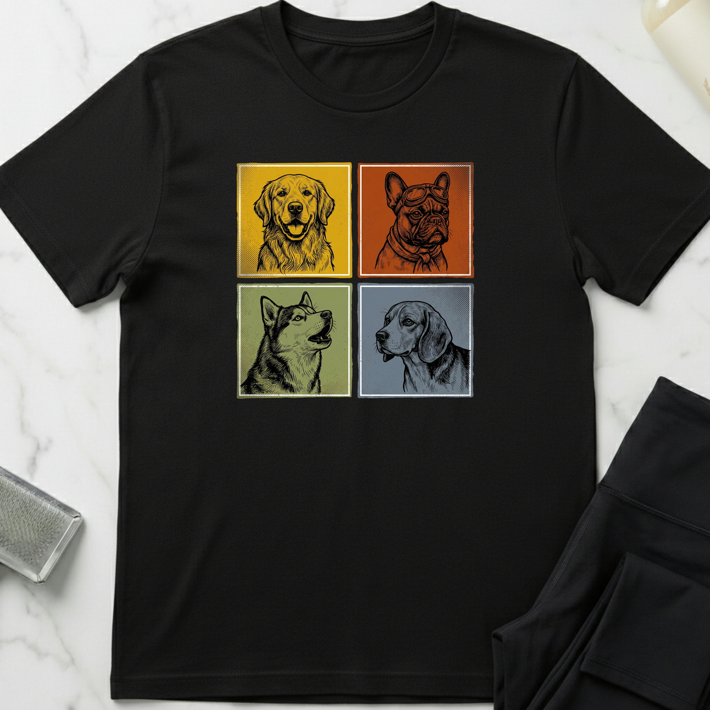 Black t-shirt with dog illustrations in four squares on a marble surface. Minimalist dog apparel by pemuyo.