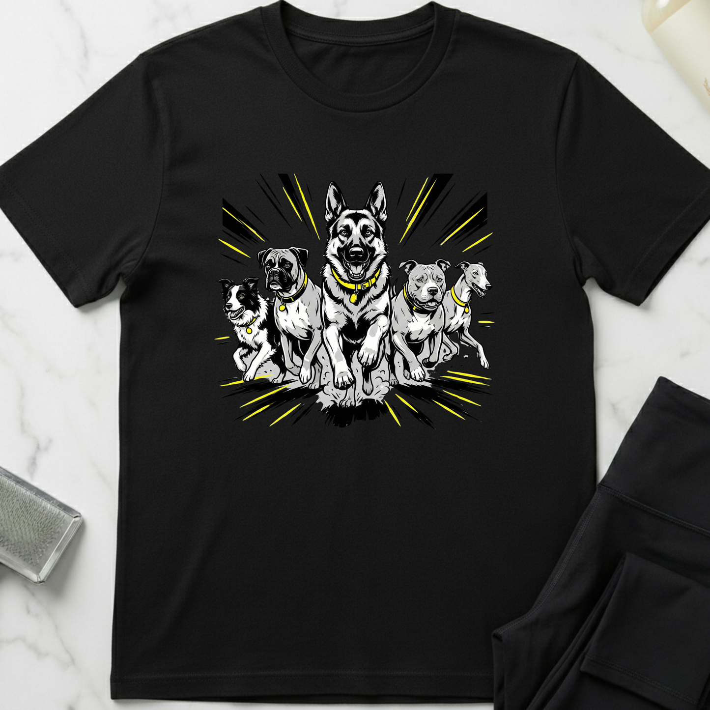 Black t-shirt with a graphic of five dogs on a white marble surface. Minimalist dog apparel by pemuyo.
