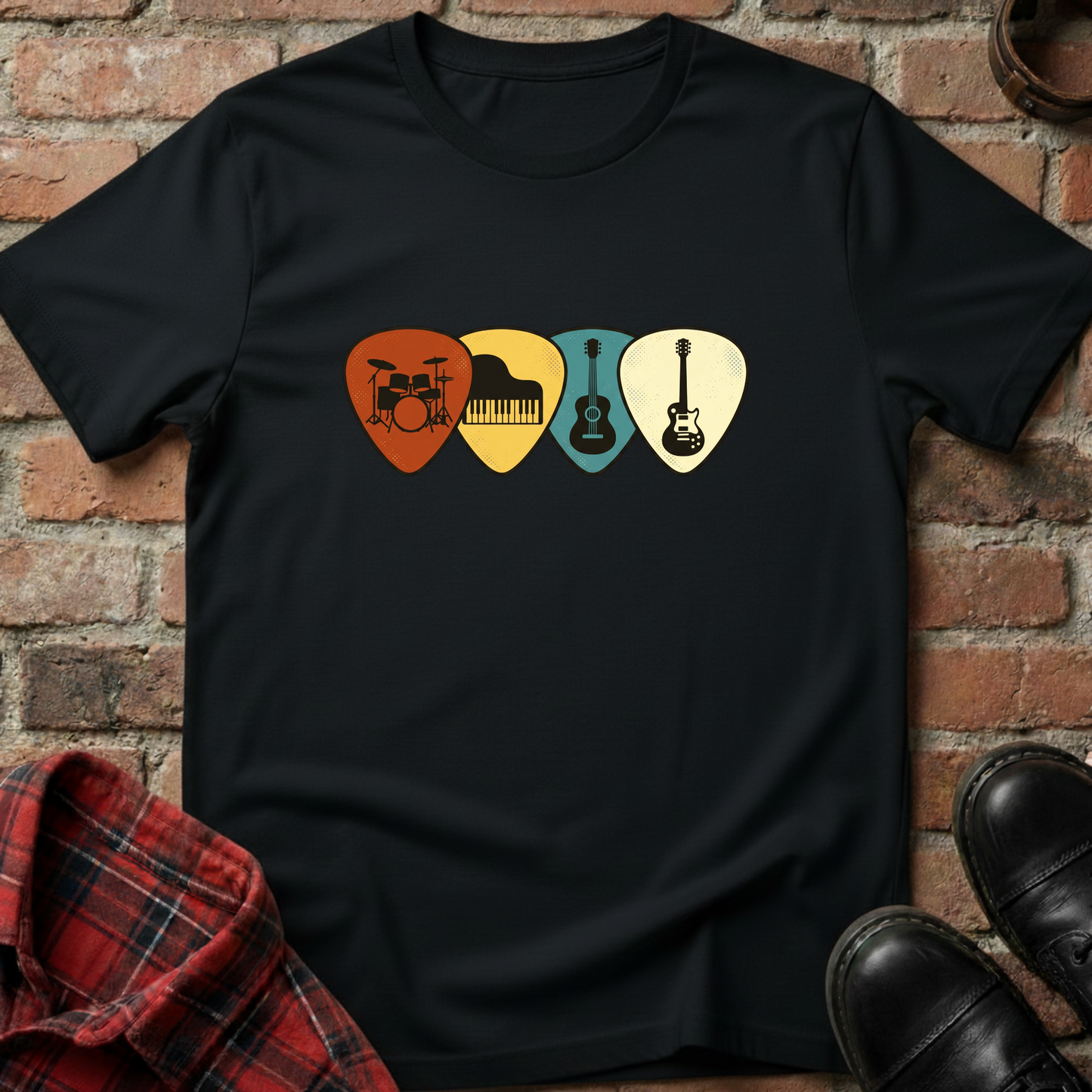 Black t-shirt with musical instrument picks design on a brick background. Minimalist music apparel by pemuyo.