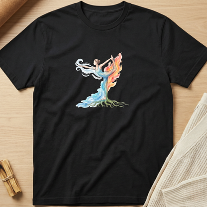 A black short-sleeve crewneck t-shirt laid flat on a light wood surface, featuring a colorful graphic of a dancer whose body forms a tree with flowing blue, orange, and green elements. Minimalist yoga apparel by pemuyo.