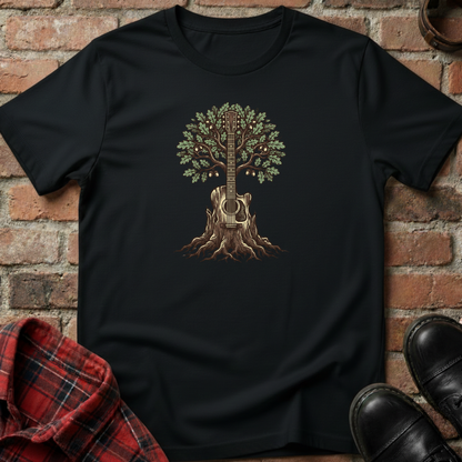 Black t-shirt with a guitar tree design on a brick wall background. Minimalist music apparel by pemuyo.