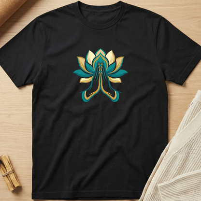 Black t-shirt with a colorful lotus flower design on a wooden surface. Minimalist yoga apparel by pemuyo.