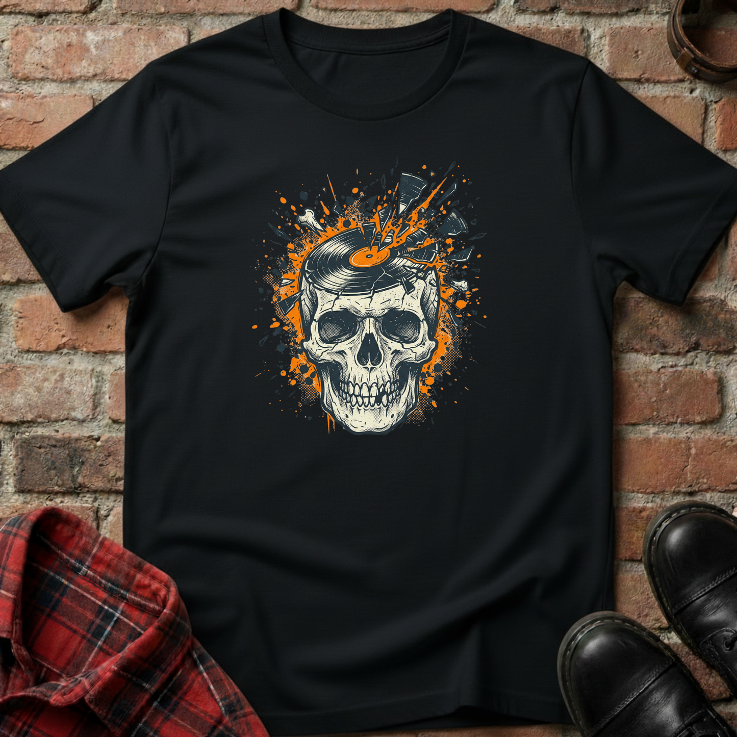 Black t-shirt with a skull design on a brick wall background. Minimalist music apparel by pemuyo.