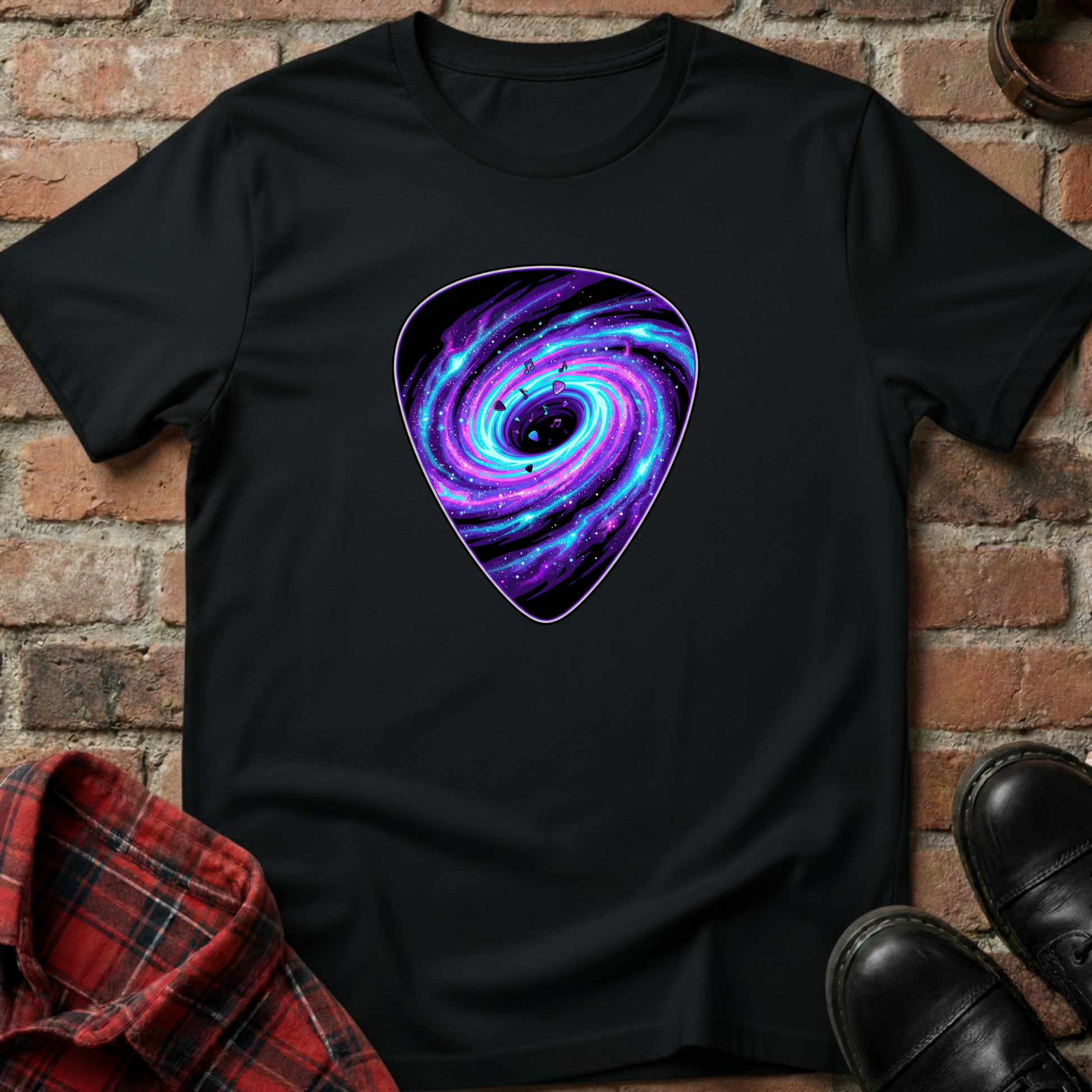 Black t-shirt with a purple and blue galaxy design on a brick wall background. Minimalist music apparel by pemuyo.