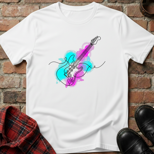 White t-shirt with colorful guitar design on a brick surface. Minimalist music apparel by pemuyo.
