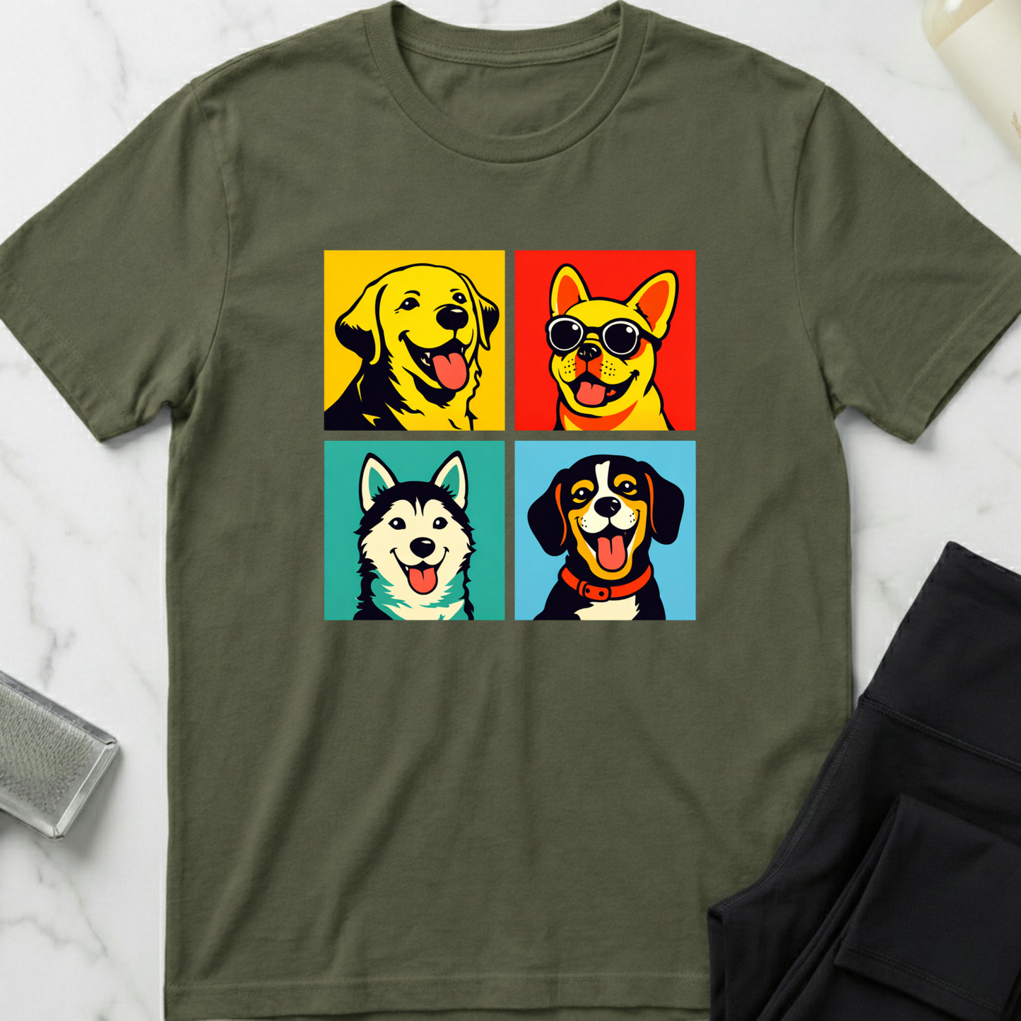 Green t-shirt with dog graphic design on a white marble surface. Minimalist dog apparel by pemuyo.