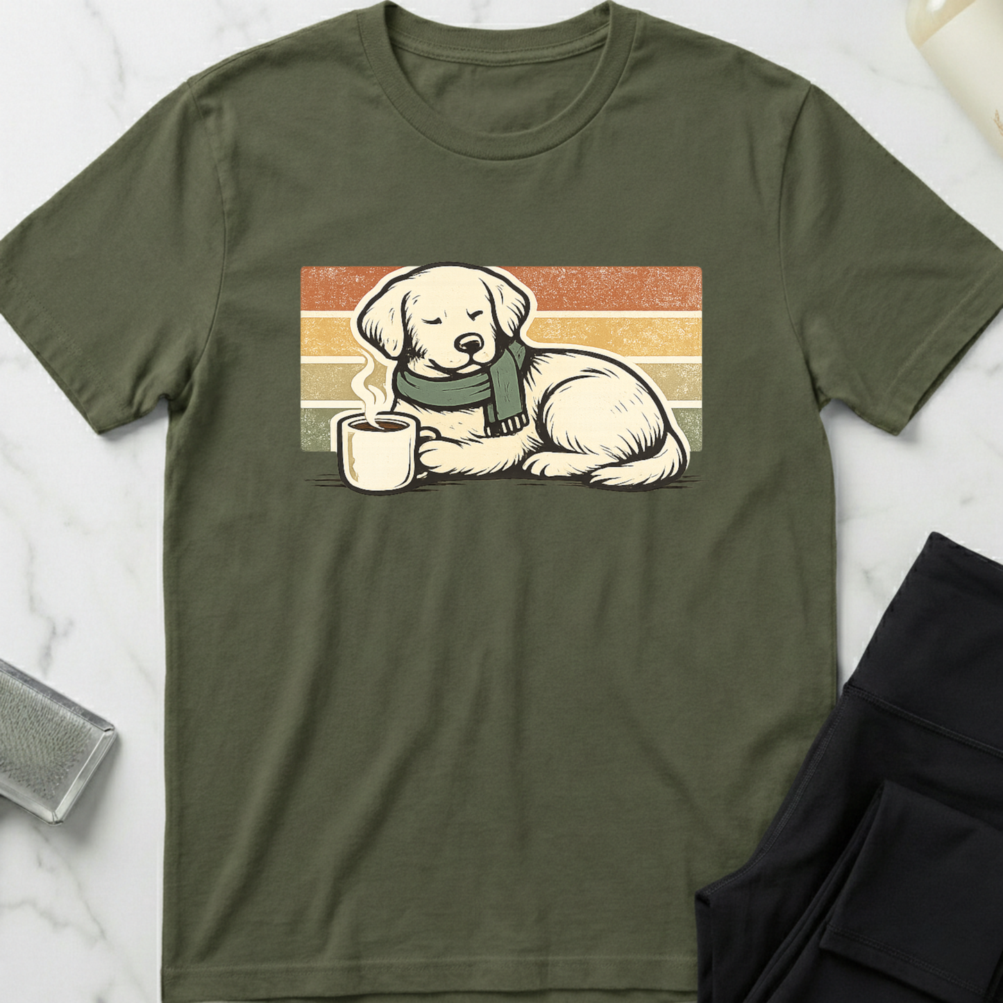 Green t-shirt with a graphic of a dog wearing a scarf and holding a mug on a white marble surface. Minimalist dog apparel by pemuyo.