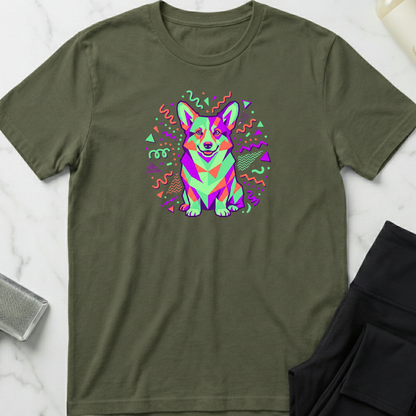 Green t-shirt with a colorful dog graphic on a white marble surface. Minimalist dog apparel by pemuyo.