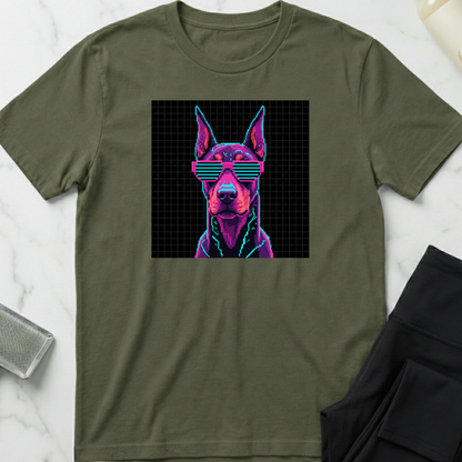 Green t-shirt with a dog wearing sunglasses graphic on a white marble surface. Minimalist dog apparel by pemuyo.