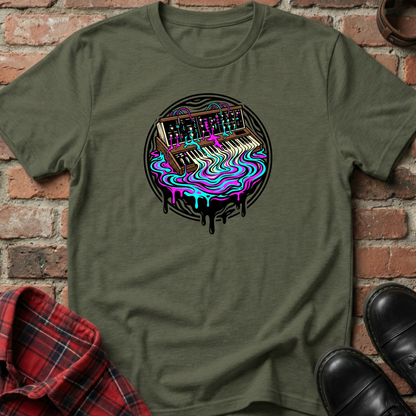 Green t-shirt with a colorful keyboard graphic on a brick wall background. Minimalist music apparel by pemuyo.