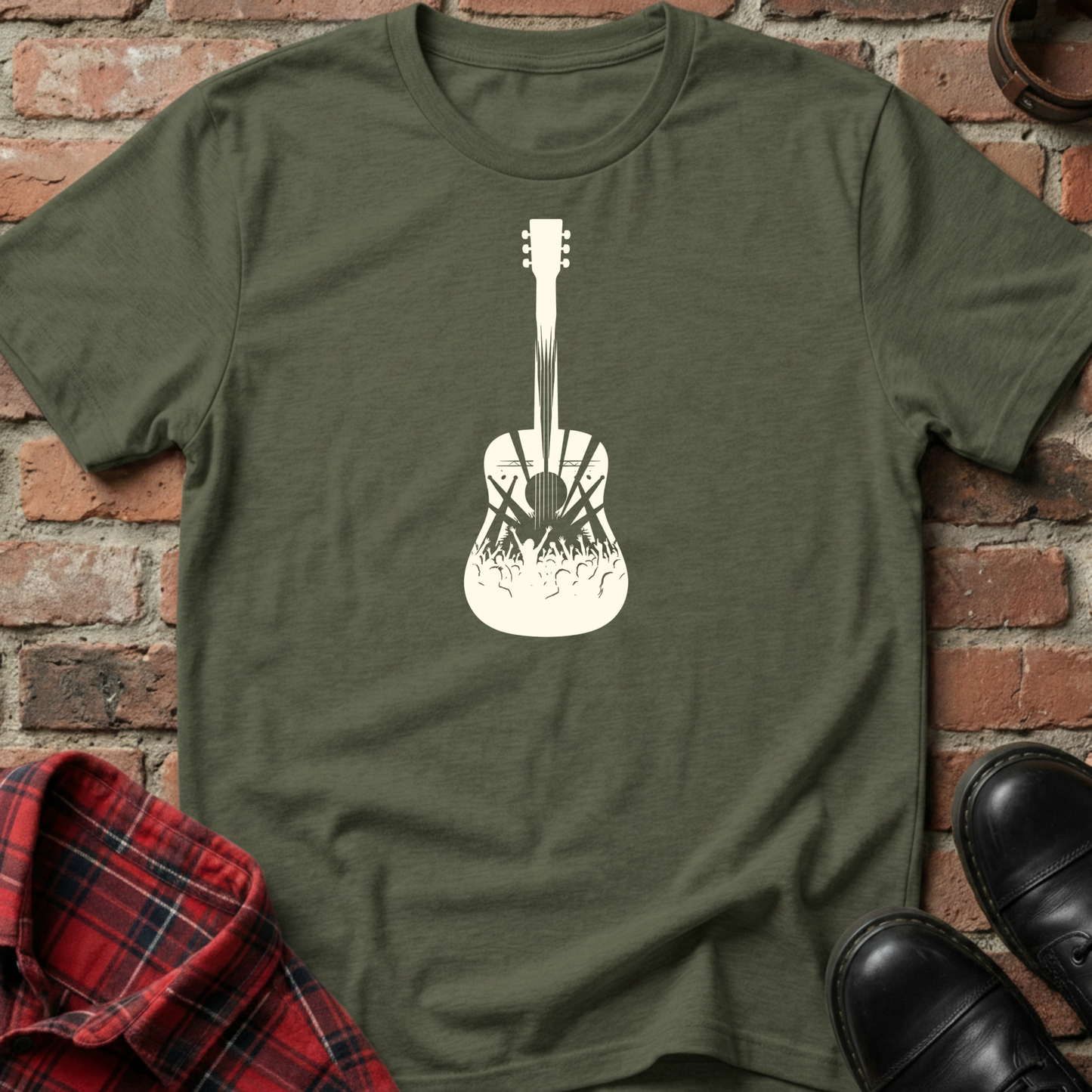 Green t-shirt with a white guitar graphic on a brick background. Minimalist music apparel by pemuyo.