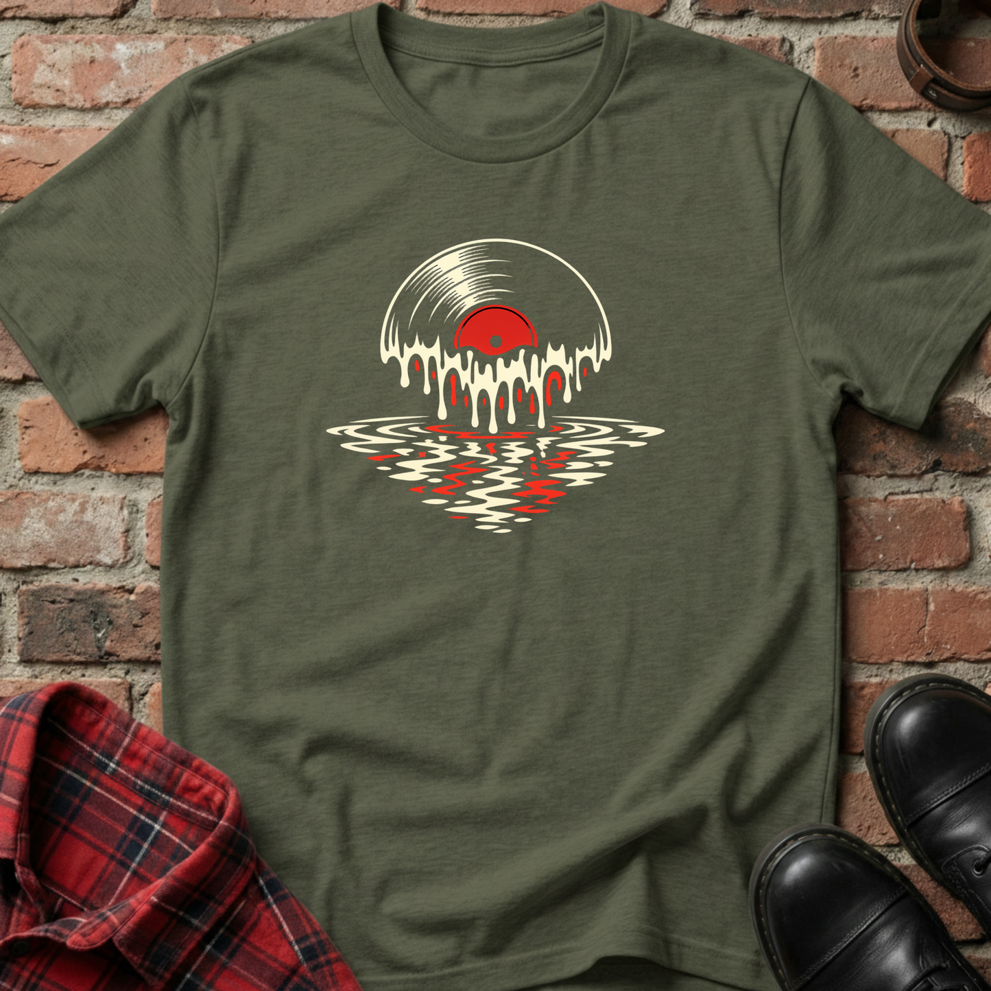 Green t-shirt with vinyl record design on a brick background. Minimalist music apparel by pemuyo.