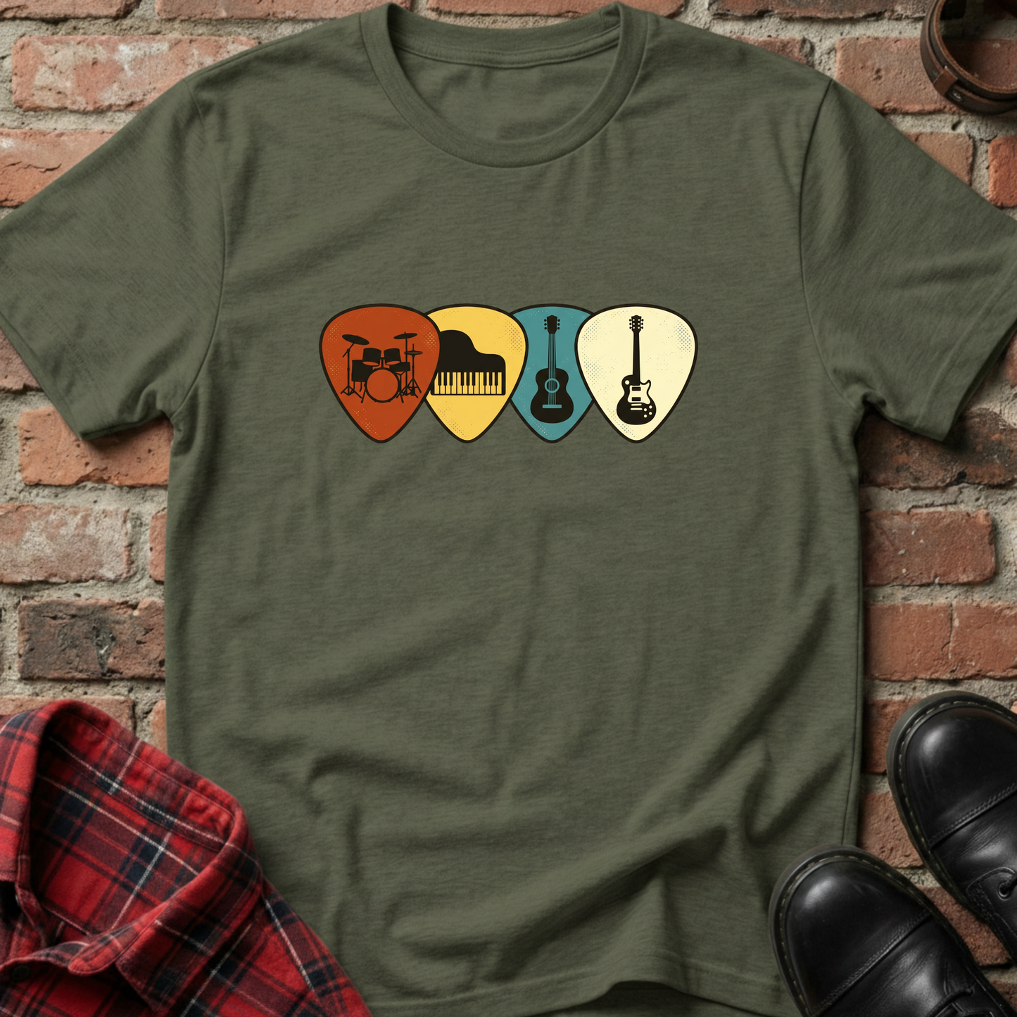 Green t-shirt with musical instrument picks design on a brick background. Minimalist music apparel by pemuyo.