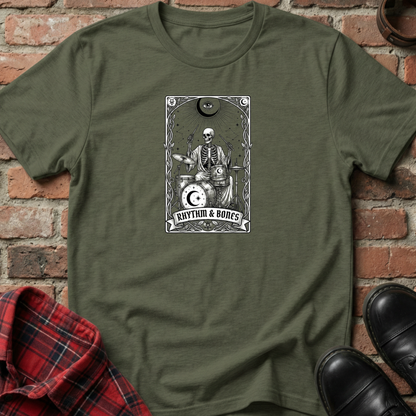 Green t-shirt with a skeleton playing drums graphic on a brick background. Minimalist music apparel by pemuyo.