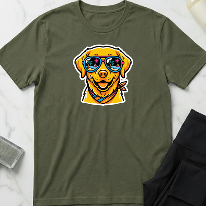 Green t-shirt with a dog wearing sunglasses graphic on a marble surface. Minimalist dog apparel by pemuyo.