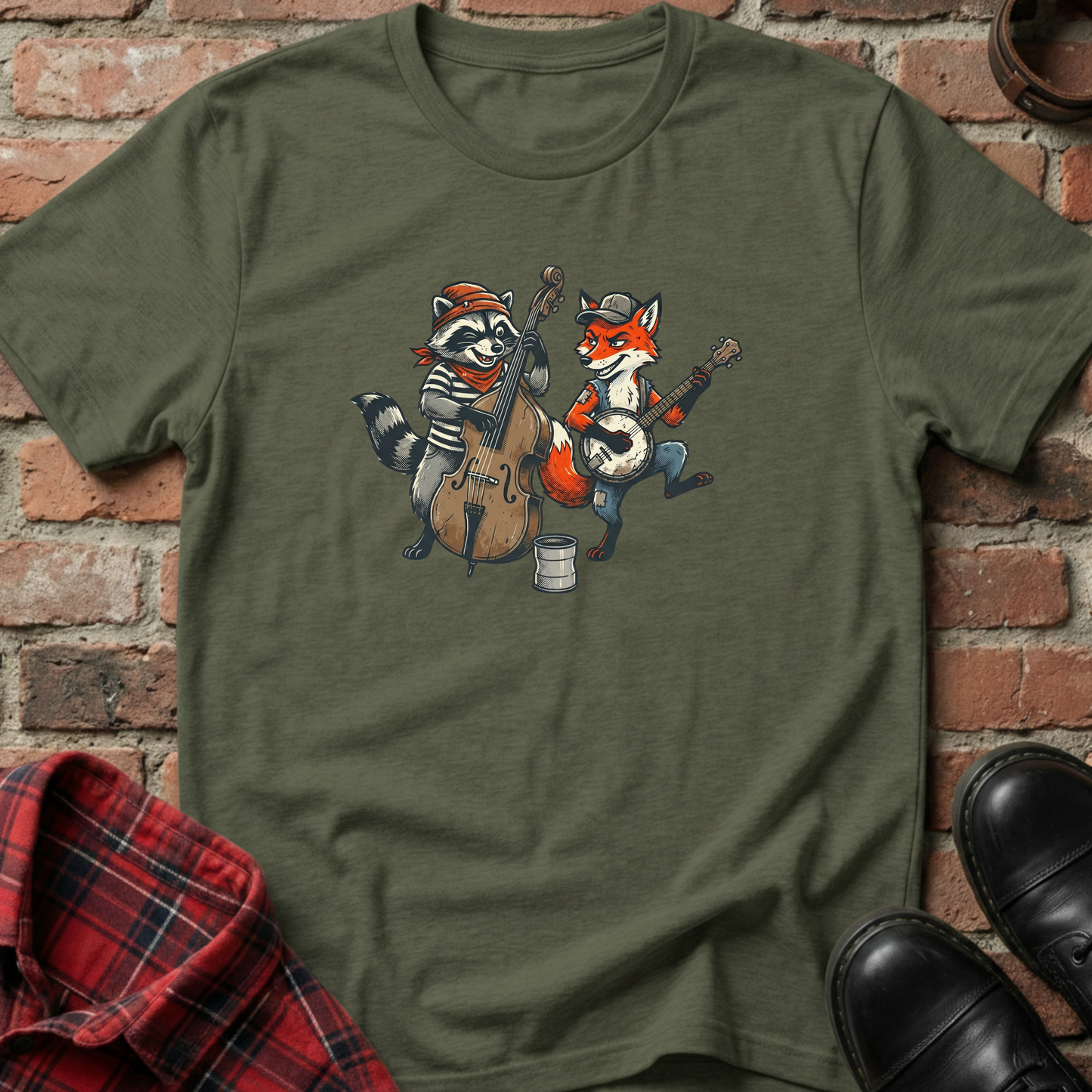 Green t-shirt with cartoon raccoon and fox playing instruments on a brick wall background. Minimalist music apparel by pemuyo.
