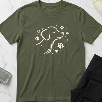 Green t-shirt with a dog illustration on a marble surface. Minimalist dog apparel by pemuyo.