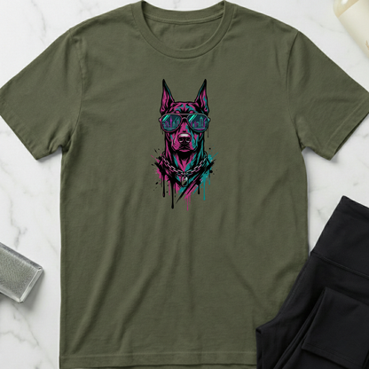 Green t-shirt with a dog graphic design on a marble surface. Minimalist dog apparel by pemuyo.