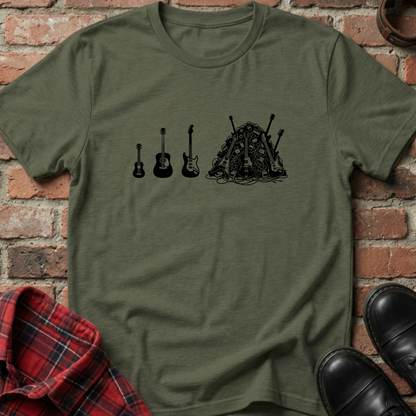 Green t-shirt with musical instrument illustrations on a brick wall background. Minimalist music apparel by pemuyo.