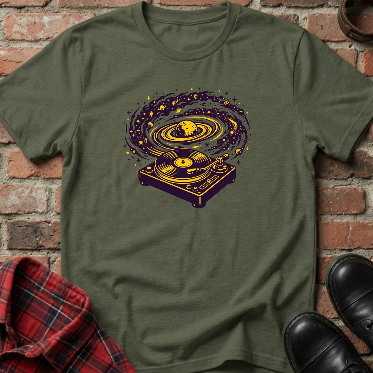 Green t-shirt with a graphic design of a turntable and vinyl record on a brick background. Minimalist music apparel by pemuyo.
