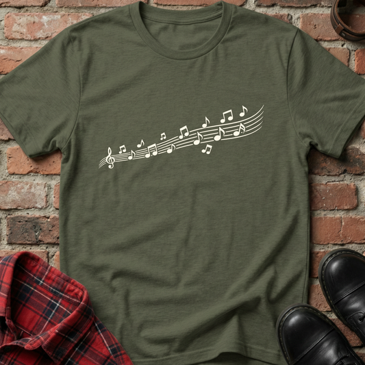 Green t-shirt with musical note design on a brick wall background. Minimalist music apparel by pemuyo.