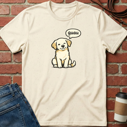 Beige t-shirt with a dog graphic and 'guau' speech bubble on a brick wall background. Minimalist dog apparel by pemuyo.