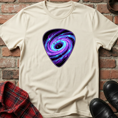 Beige t-shirt with a purple and blue spiral design on a brick wall background. Minimalist music apparel by pemuyo.