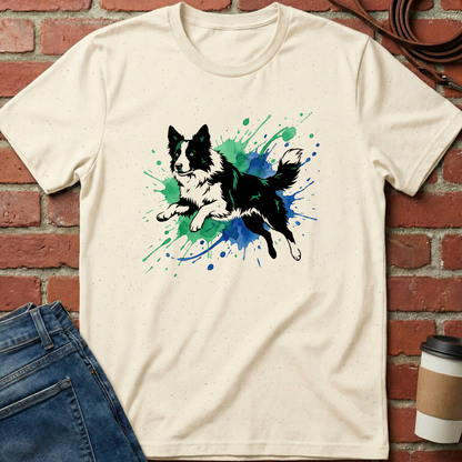 Beige t-shirt with a dog graphic on a brick wall background. Minimalist dog apparel by pemuyo.