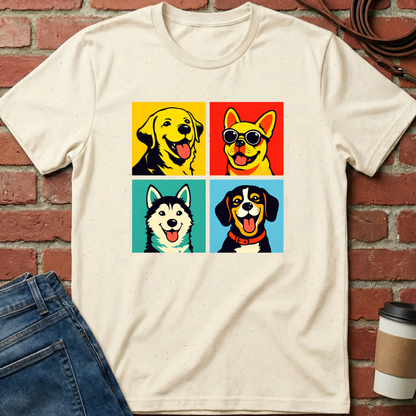 Beige t-shirt with dog illustrations on a brick wall background. Minimalist dog apparel by pemuyo.