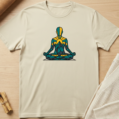 Beige t-shirt with a geometric meditation design on a wooden surface. Minimalist yoga apparel by pemuyo.