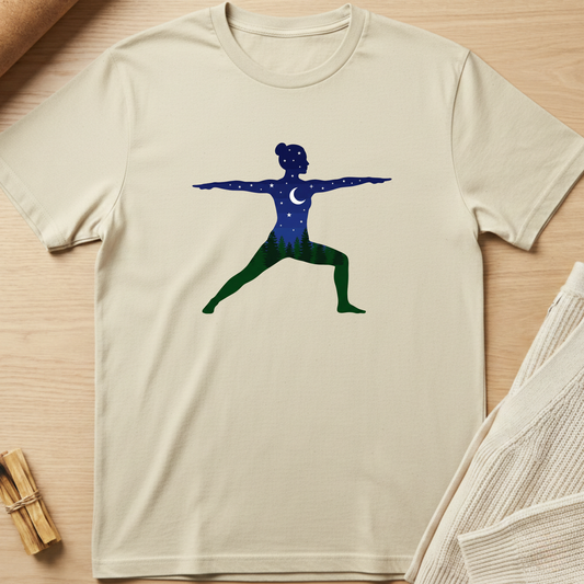 Beige t-shirt with a blue and green graphic of a person in a yoga pose on a wooden surface. Minimalist yoga apparel by pemuyo.