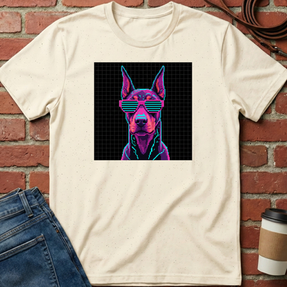 Beige t-shirt with a graphic of a dog wearing sunglasses on a brick wall background. Minimalist dog apparel by pemuyo.
