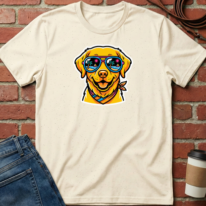 Beige t-shirt with a dog graphic wearing sunglasses on a brick wall background. Minimalist dog apparel by pemuyo.