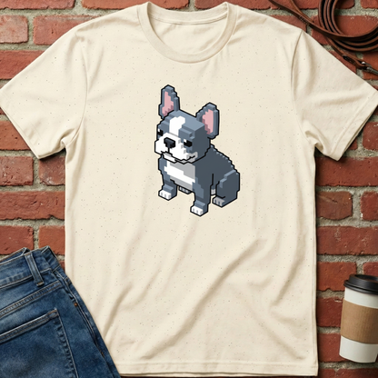Beige t-shirt with pixelated dog graphic on a brick wall background. Minimalist dog apparel by pemuyo.