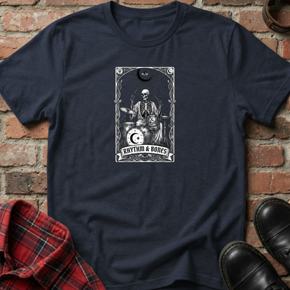 Navy blue t-shirt with skeleton playing drums graphic on a brick wall background. Minimalist music apparel by pemuyo.