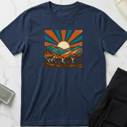 Navy blue t-shirt with a graphic design of mountains and sun on a marble surface. Minimalist dog apparel by pemuyo.