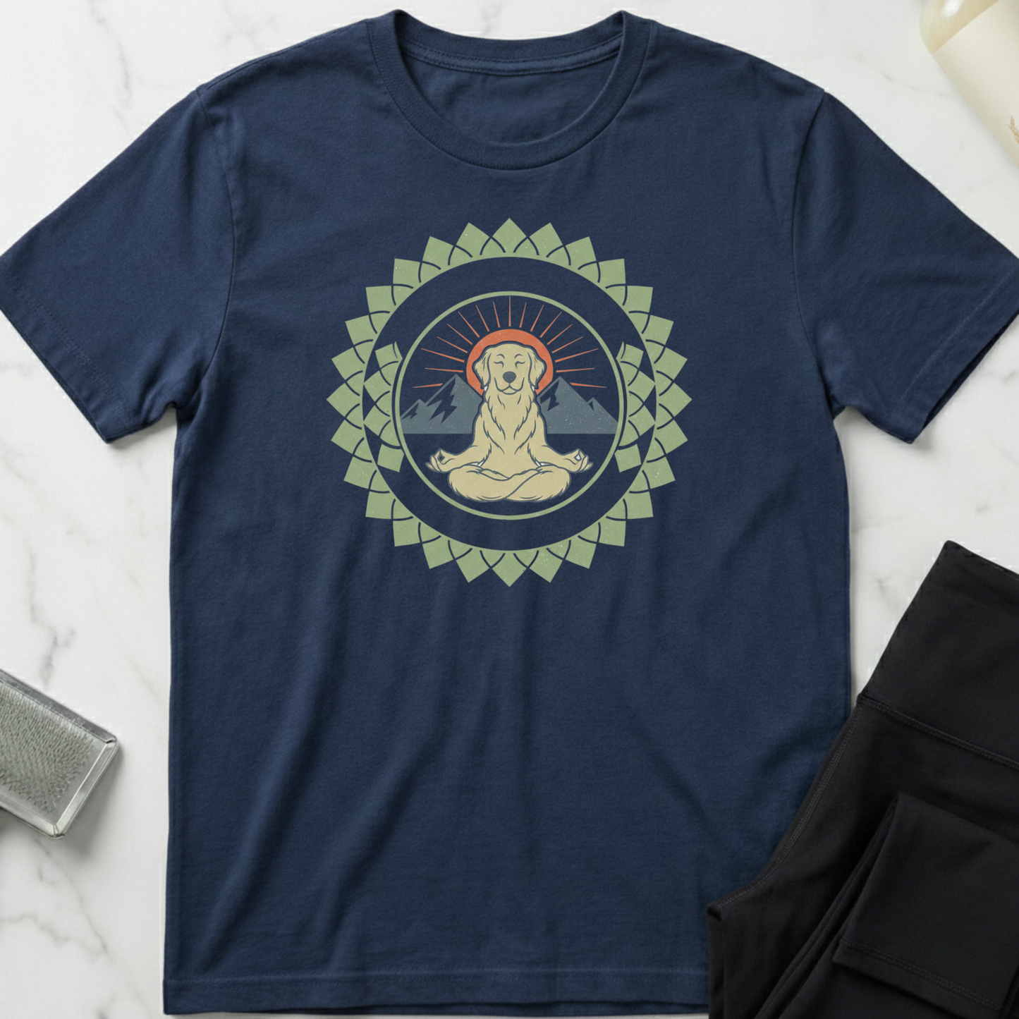Navy blue t-shirt with a meditating Buddha graphic on a marble surface. Minimalist yoga apparel by pemuyo.