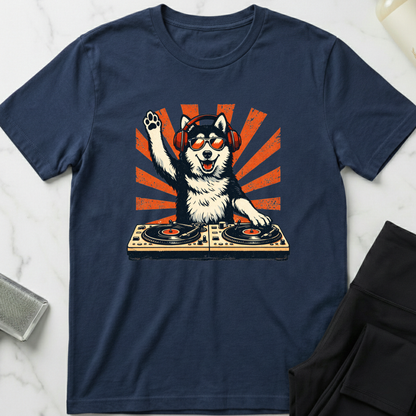 Navy blue t-shirt with a graphic of a dog DJ on a white marble surface. Minimalist dog apparel by pemuyo.