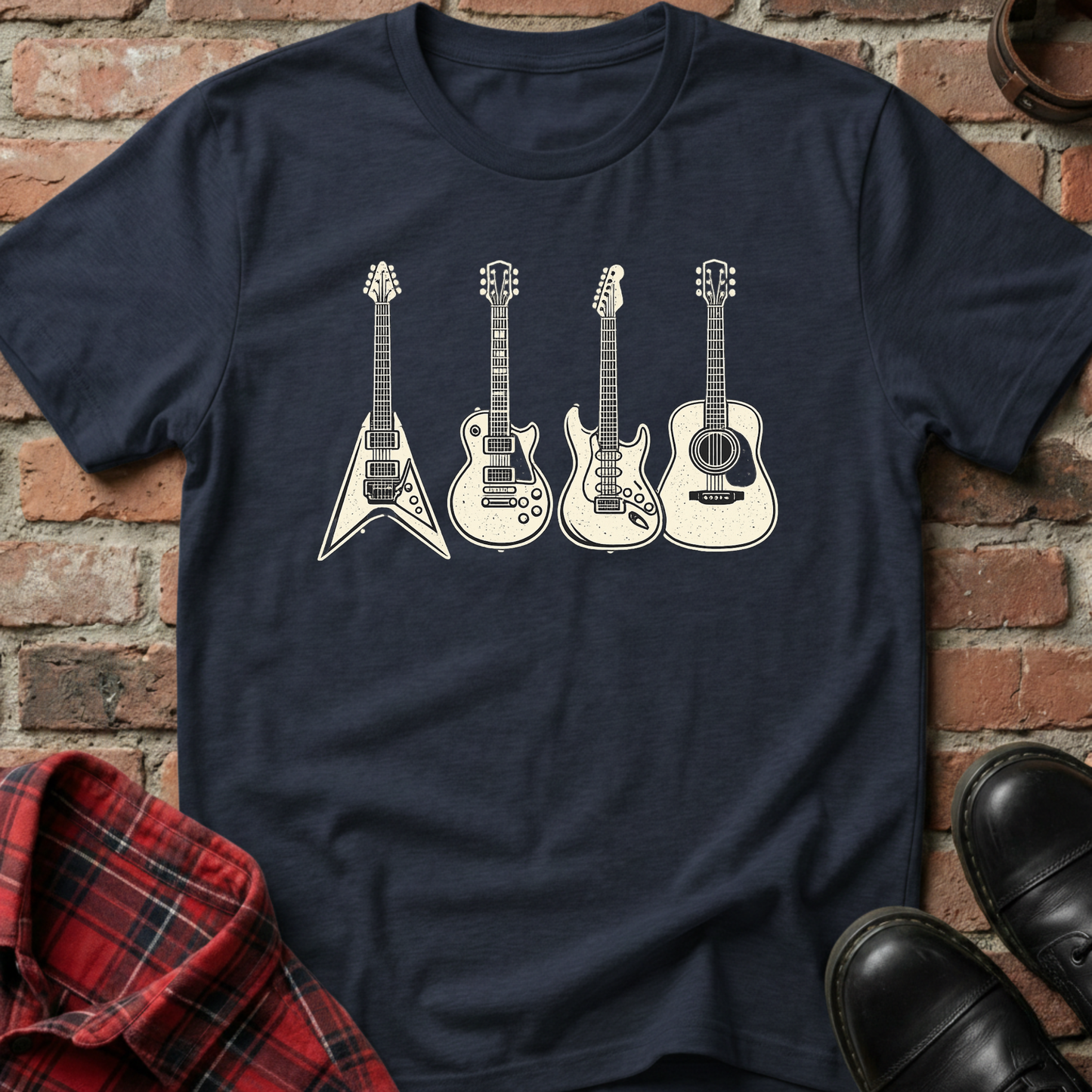 Navy blue t-shirt with white guitar graphic on a brick background. Minimalist music apparel by pemuyo.