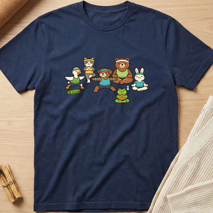 Navy blue t-shirt with cartoon characters on a wooden surface. Minimalist yoga apparel by pemuyo.