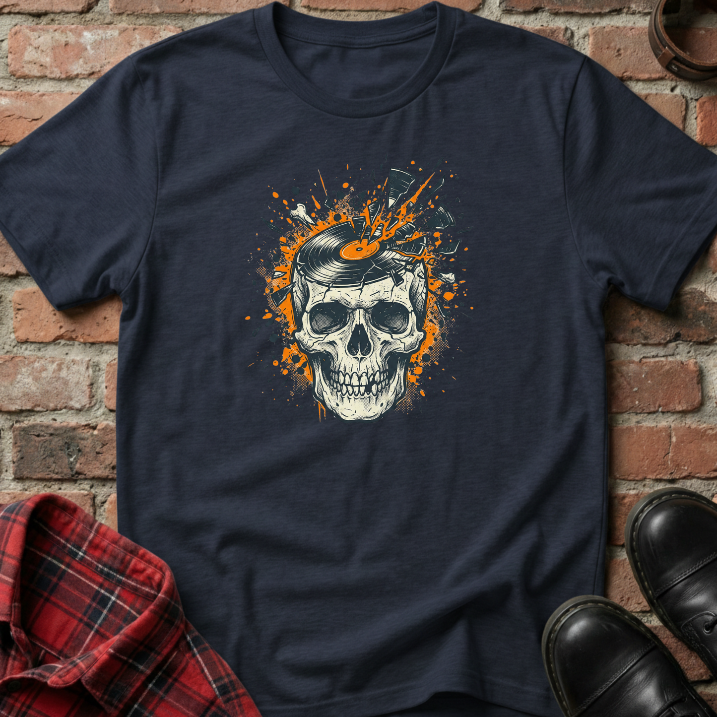Navy blue t-shirt with a skull design on a brick wall background. Minimalist music apparel by pemuyo.