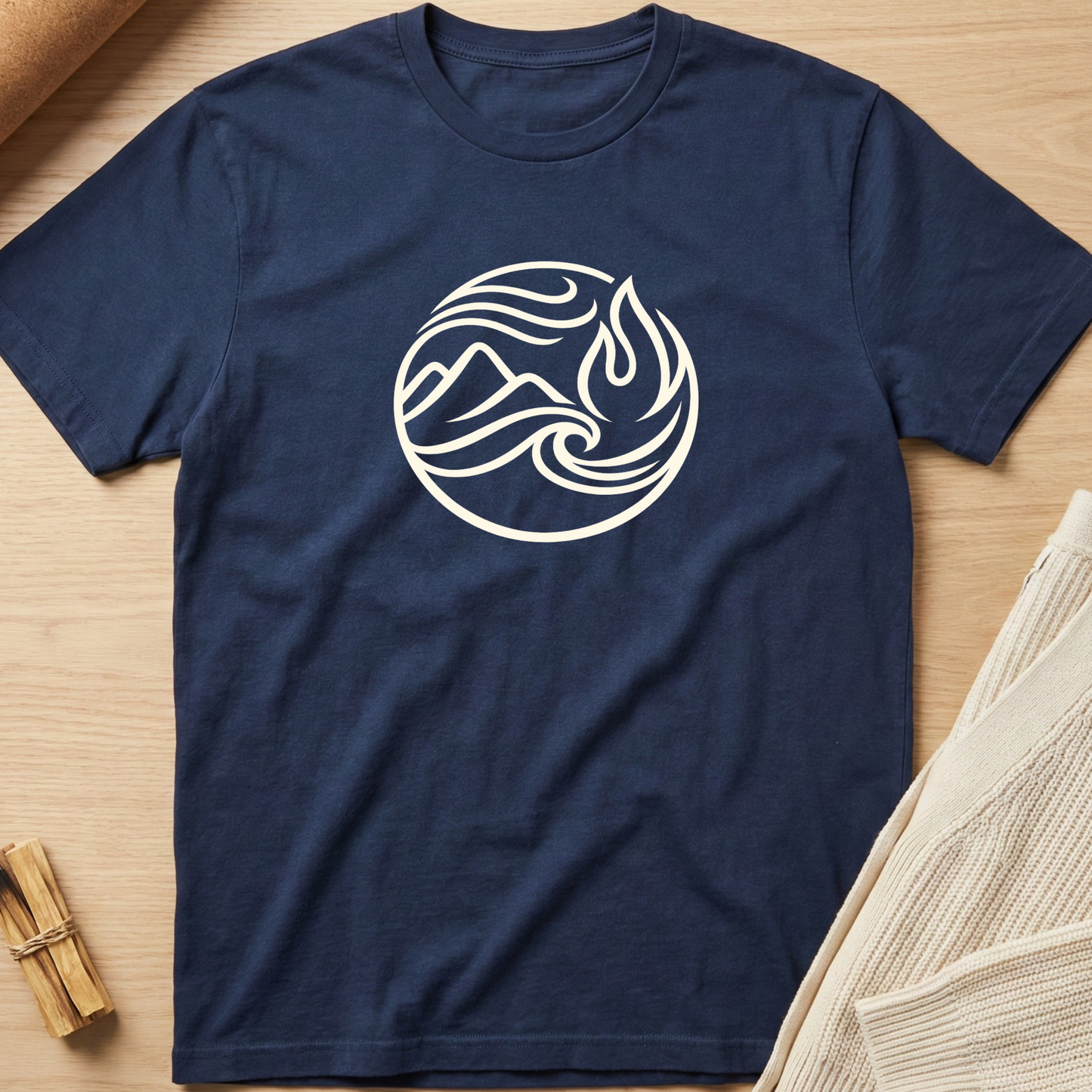 Navy blue t-shirt with a white logo on a wooden surface. Minimalist yoga apparel by pemuyo.