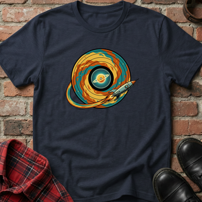 Navy blue t-shirt with a colorful space-themed graphic on a brick surface. Minimalist music apparel by pemuyo.