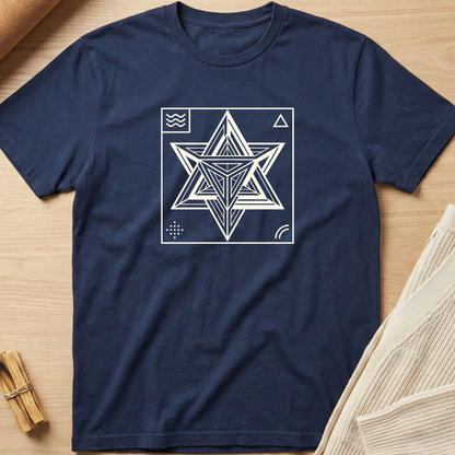 Blue t-shirt with a geometric star design on a wooden surface. Minimalist yoga apparel by pemuyo.