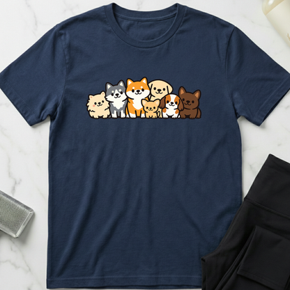 Navy blue t-shirt with cartoon dog illustrations on a marble surface. Minimalist dog apparel by pemuyo.