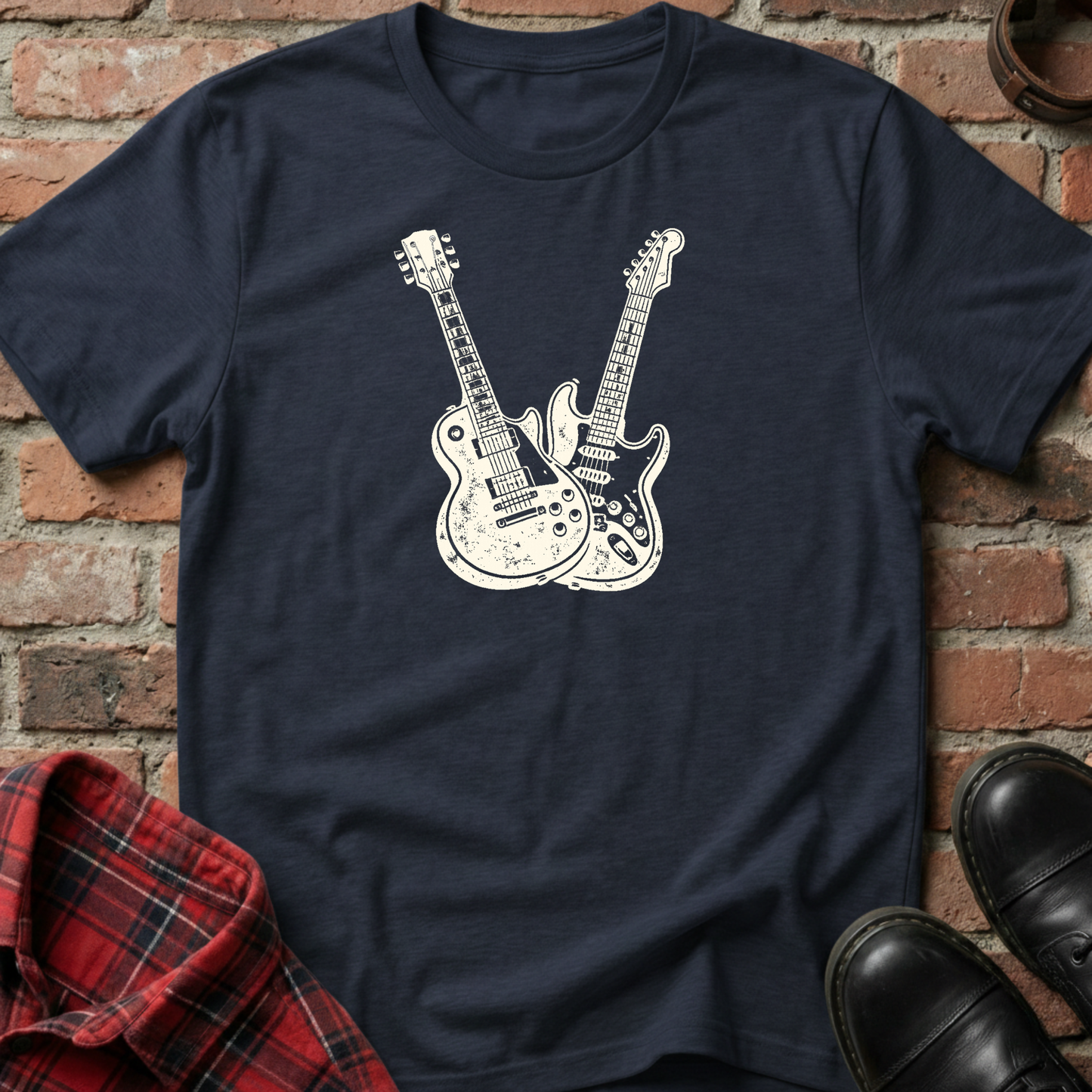 Navy blue t-shirt with white guitar design on a brick background. Minimalist music apparel by pemuyo.